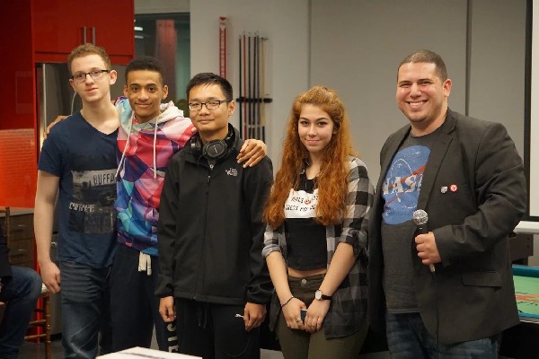 Photo: AI Winners Christopher Tan, Timothy Goltser, Zeynep Akpinar, Curtis Mason. All four are High School students at Staten Island Tech. Their prize was sponsored by Fownders. Photo Credit: Courtesy IDT Corp.