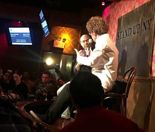 Photo: Aaron Price talks to James Altucher at Stand Up NY. Photo Credit: Rob Rinderman