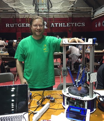 Photo: FUBAR labs' Rick Anderson shows off an Orion 3d Printer that was made available to participants in the hardware section of the event Photo Credit: Courtesy Brendan Kaplan