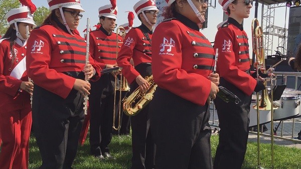 Photo: The Hoboken City High School band arrives to play the National Anthem. Photo Credit: Esther Surden