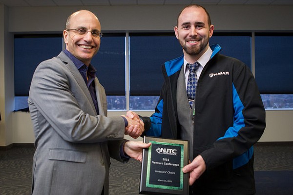 Photo: NJTC CEO Jim Barrood congratulates Ryan Shearman, CEO of FUSAR. Photo Credit: Courtesy NJTC