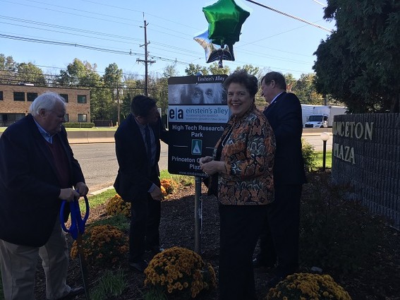 Photo: Everyone was exteremly happy to be unveiling this sign on Route 1 in central New Jersey to dedicate this office park as part of Einstein's Alley. We liked this photo because it caught Einstein's Alley Executive Director Katherine Kish in a full on smile, while Assemblyman and Head of Science Education at the Princeton University Plasma Physics Laboratory Andrew Zwicker examines the sign. This photo is another one of those optimistic symbols that reminds us tech and biotech is alive and well in New Jersey. Photo Credit: Esther Surden