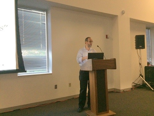 Photo: Michael Ehrlich speaking at the Innovation Tech Meetup anniversary. Photo Credit: Esther Surden