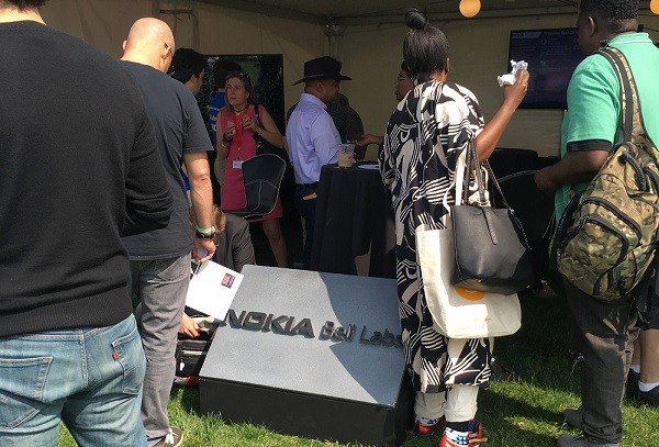 Photo: There were crowds at the Nokia Bell Labs tent. Photo Credit: Esther Surden