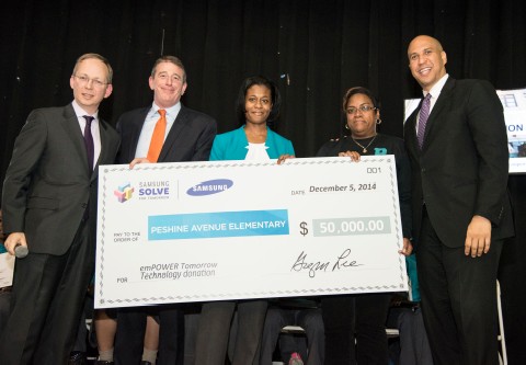 Photo: Samsung presents a $50,000 check to Peshing Avenue Elementary School in Newark. Photo Credit: Courtesey Samsung