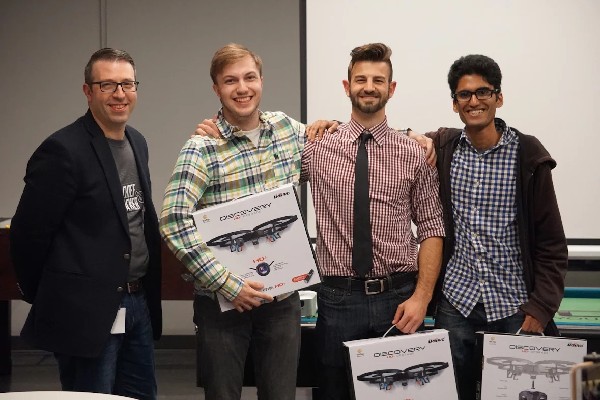 Photo: Second place winners Nicholas Feuer, Alben Kalambukadu, and Stanimir Stoychev holding their Drones. Zev Green, IDT Director of Emerging&nbsp;Technologies (far left). Photo Credit: Courtesy IDT Corp.