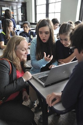 Photo: Newark Public Schools Superintendent Cami Anderson having a STEM "girl power" moment at Oliver Street School, after they celebrated being declared winners of the national Samsung "Solve for Tomorrow" contest. Photo Credit: Newark Public Schools