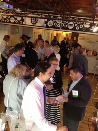 Photo: Attendees networking at the Tech Ideas and Demo Days event at Cowerks in Asuby Park. Photo Credit: NJTC