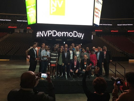 Photo: NVP Labs hosted a demo day at the Prudential Center at the end of June. Here we see members from all of the startup teams who had pitched that day, along with the NVP Labs staff, posing for photos on the floor of the Devil's arena in Newark. It's a fun photo in a fun setting that captures the excitement around the NVP Labs endeavor to accelerate great startups that will then create great jobs in Newark.
&nbsp; Photo Credit: Esther Surden